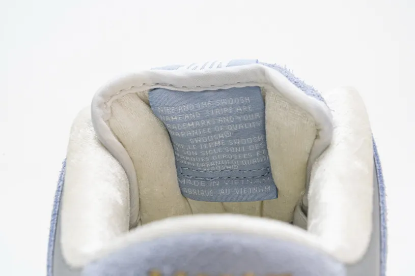 Sean Cliver x Nike SB Dunk Low DC9936-100